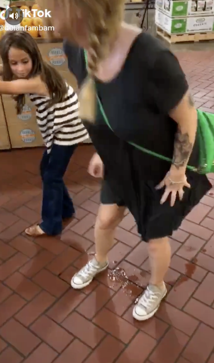 Woman Peeing On Floor